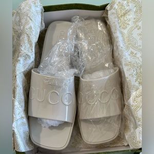 Faux Gucci women’s rubber slide sandal